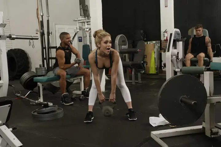 Kali Roses teases her pierced tits, Karlee Grey's top comes undone, and Kali then sucks Logan Long's cock before he pounds her pussy in the locker room. — 9